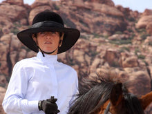 Load image into Gallery viewer, Female rider in English riding gear wearing the Da Brim Equestrian Petite Helmet Brim Visor in black.